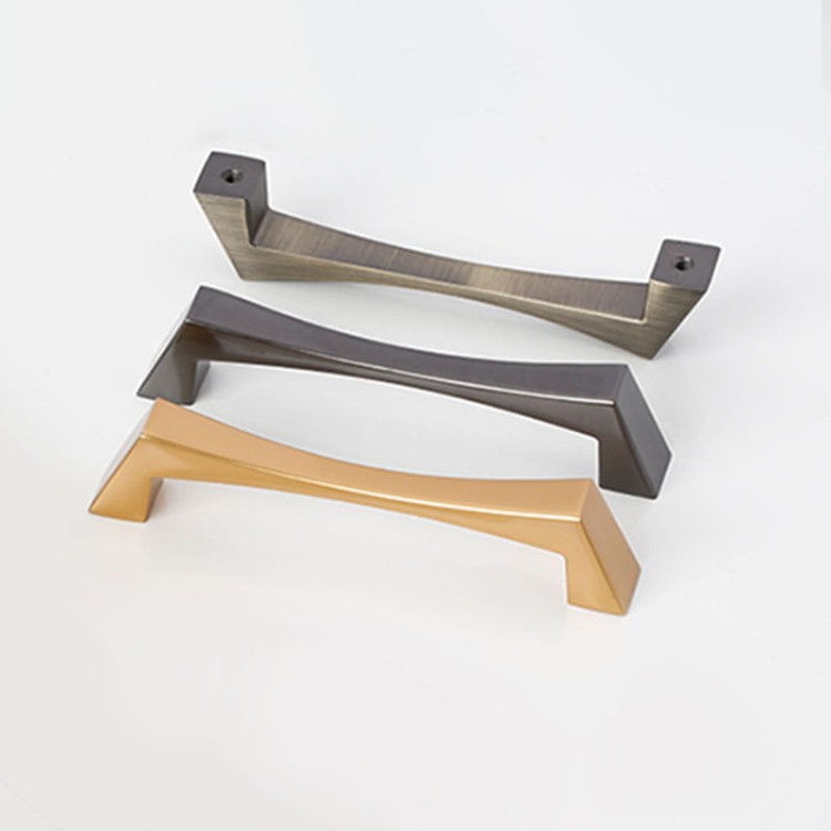 Möbelgriff Peral – moderner eleganter Griff in gebürstetem Gold, Gold, Schwarz, Perlgrau und gebürstetem Nickel. Größen 128–320 mm, ideal für Küchen- und Badmöbel, Schränke und Schubladen.