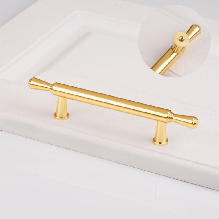 Möbelgriff Grava – T-Bar-Griff in Mattschwarz oder glänzendem Gold, erhältlich als Knopf sowie in 96, 128 und 192 mm. Ideal für Küchenschränke, Kommoden und Garderoben – egriffe.at