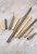 Möbelgriff Terra – moderner minimalistischer Griff in Gold oder gebürstetem Grau. Größen 96, 128, 192, 320, 768 und 960 mm. Für Küchen- und Badschränke sowie Schubladen – egriffe.at