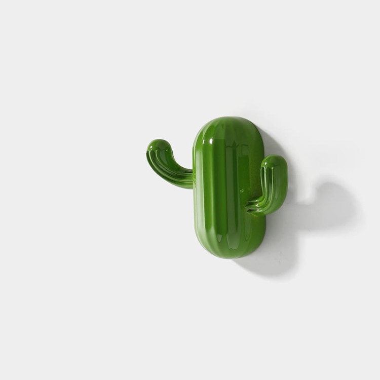 Wandhaken Cactus – verspielt und modern, ideal für Flur, Küche, Bad und Kinderzimmer. Robust und leicht zu montieren. Farben: Gold, Rot, Grün und Grau.