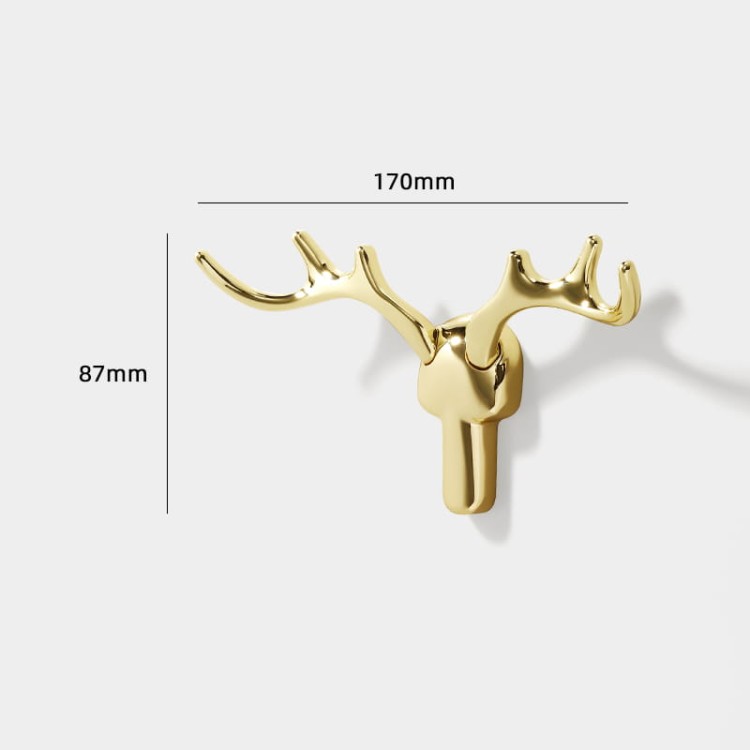 Wandhaken Alberto im modern-skandinavischen Stil, mit solider Konstruktion und einfacher Montage. Farben: Gold, gebürstetes Gold, Schwarz, Grau-Gold, Perlgrau und gebürsteter Nickel – dekorativ und funktional.