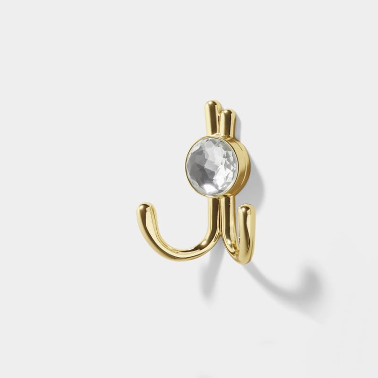 Wandhaken Rosa mit Doppelhaken und dekorativen diamantartigen Enden. Elegant, feuchtigkeitsbeständig, in vielen Gold-, Schwarz-, Silber- und Grautönen erhältlich – für Zuhause und gewerbliche Innenräume.