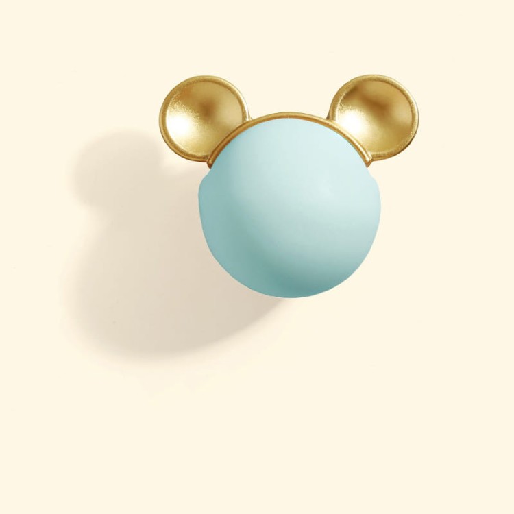 Kindermöbelgriff Mouse – pastellfarbene Kugel mit goldenen Öhrchen, ideal für Kindermöbel. Farben: Rosa, Grün, Hellblau und Weiß. Kindlich-moderner Designgriff für Kommoden, Schubladen und Schränke.