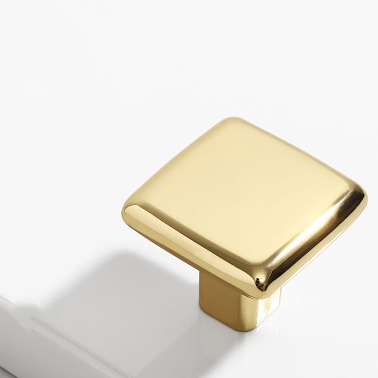 Möbelgriff Tinaja – moderner minimalistischer Griff als Knopf oder Leiste in 128 und 320 mm. Sieben trendige Farben von Weiß und Schwarz bis Gold und Grau. Ideal für Küche, Bad, Schränke und Kommoden.
