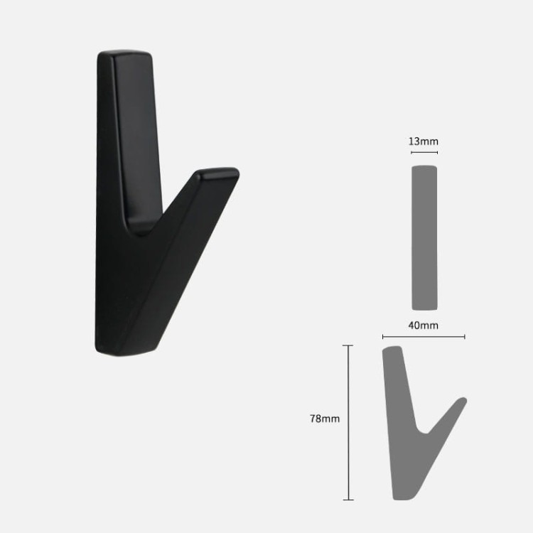 Wandhaken Bola – minimalistischer geometrischer Haken für Zuhause, Büro und Hotels. Aus robustem Metall, einfache Montage mit Schrauben im Set. Farben: Schwarz, Perlgrau und gebürstetes Gold.