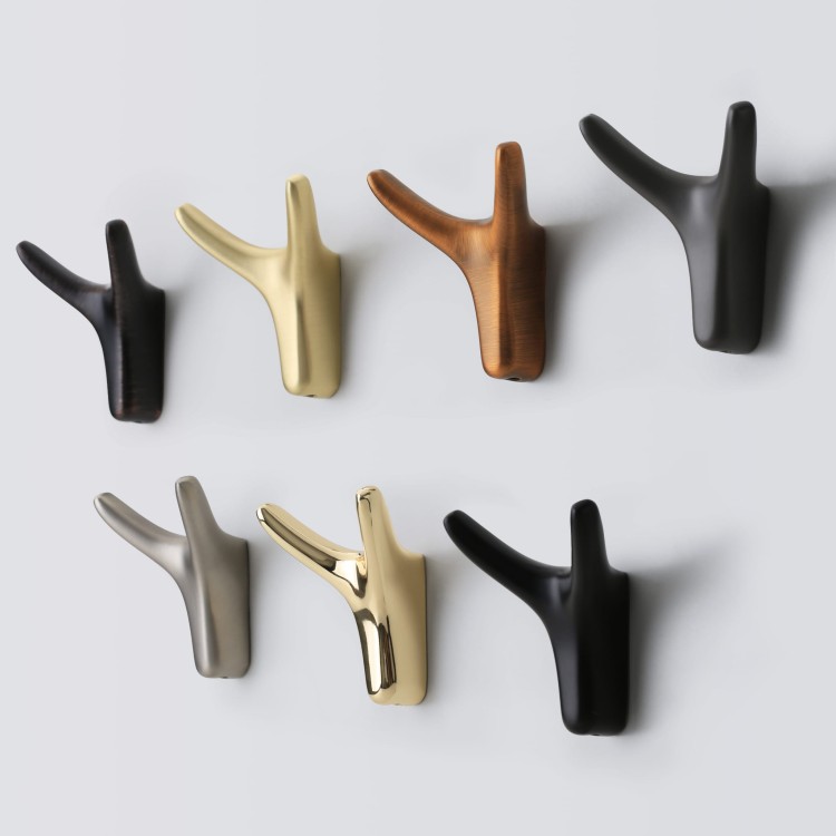 Wandhaken Tesia verbindet Funktionalität und Ästhetik – ideal für Flur, Bad, Küche, Garderobe und Büro. Farben: gebürstetes Braun, Dunkelbraun, Nickel, Perlgrau, Gold, gebürstetes Gold und Schwarz.