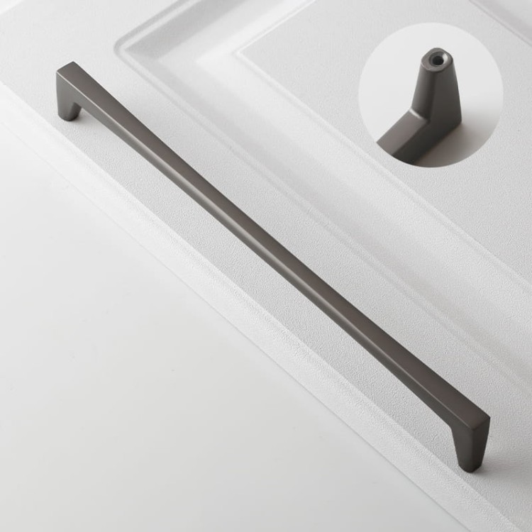 Möbelgriff Mela – moderner, klassischer und minimalistischer Griff in Schwarz, gebürstetem Gold, gebürstetem Nickel und Perlgrau. Größen 128–256 mm, ideal für Küchen- und Badmöbel, Garderoben und Kommoden.